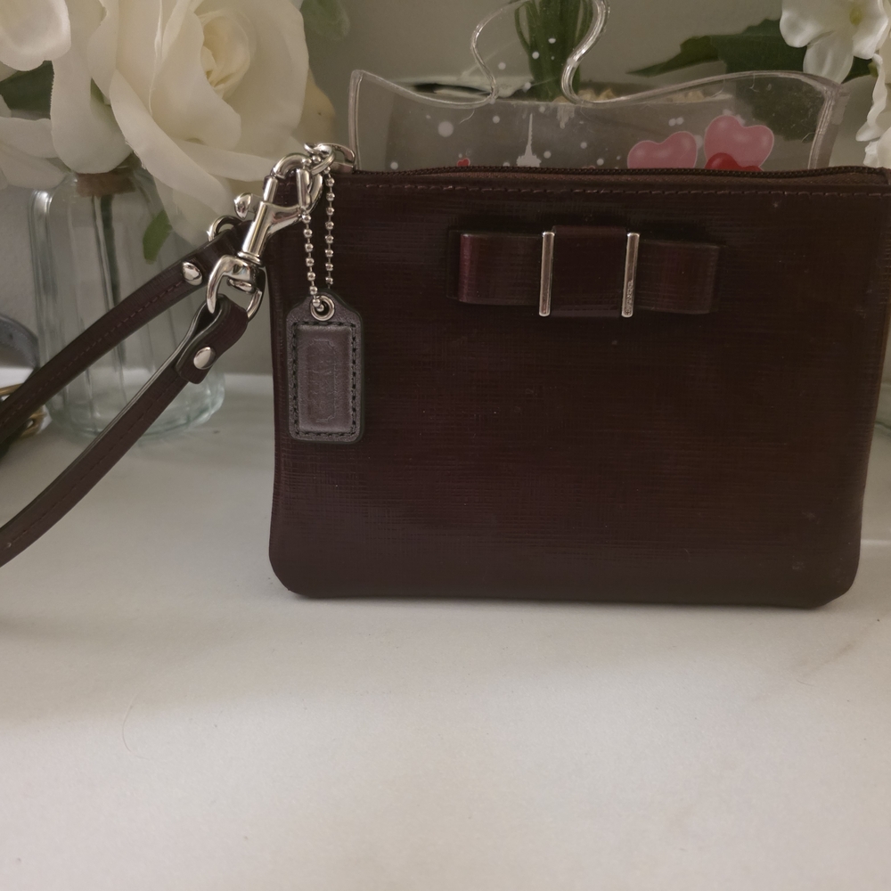 Coach Burgandy Wristlet with Bow Accent